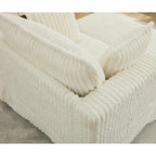 Chaise longue surdimensionnée en velours côtelé beige avec pouf