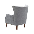 Fauteuil d'appoint transitionnel avec garniture cloutée