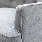 Fauteuil d'appoint transitionnel avec garniture cloutée
