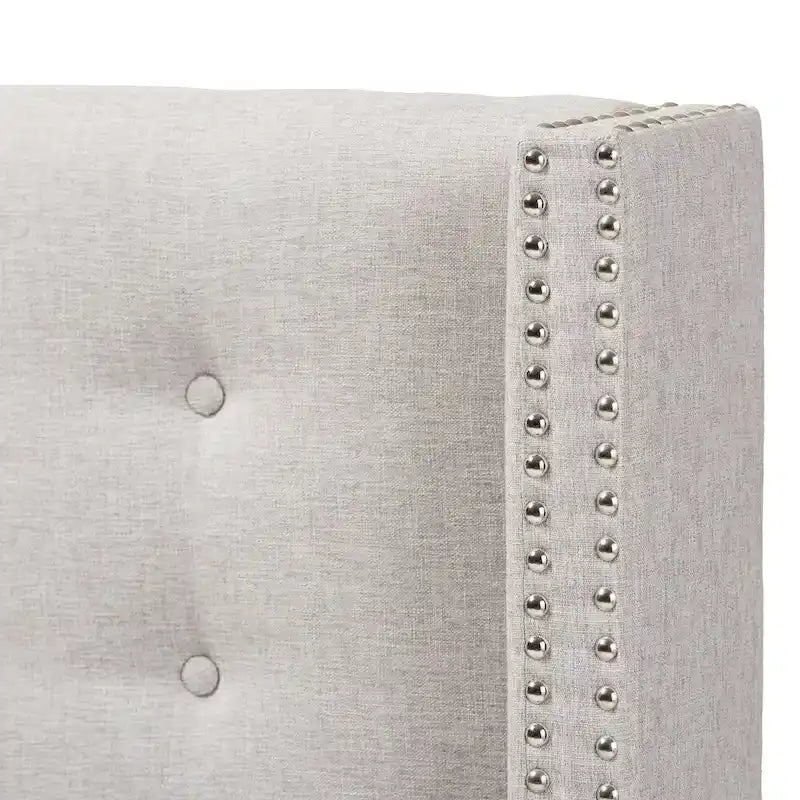 Tête de lit ailée avec capitonnage en losange