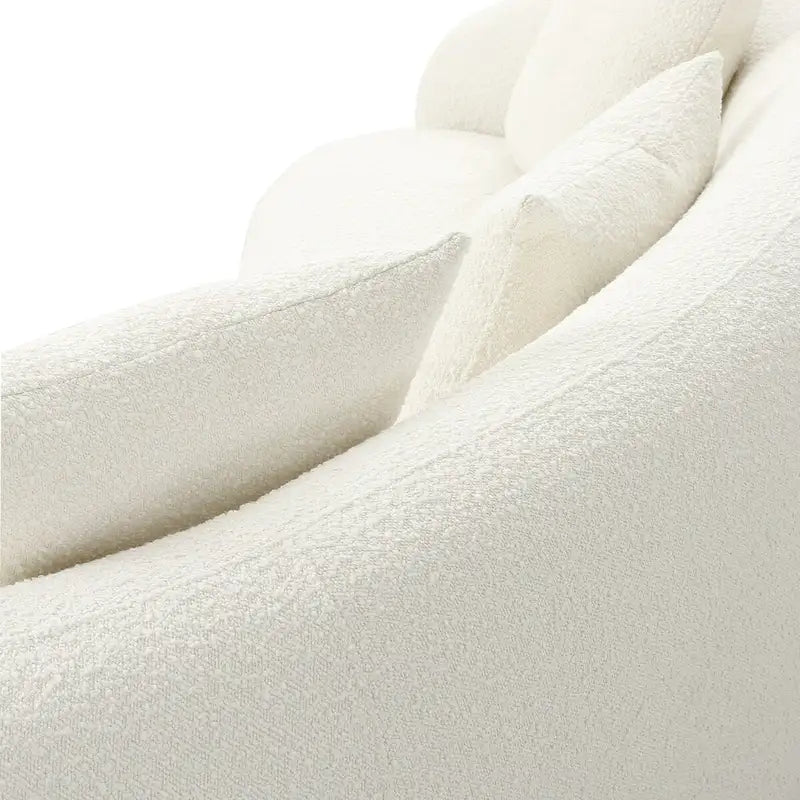 Canapé en tissu incurvé avec coussins fixes et coussins décoratifs