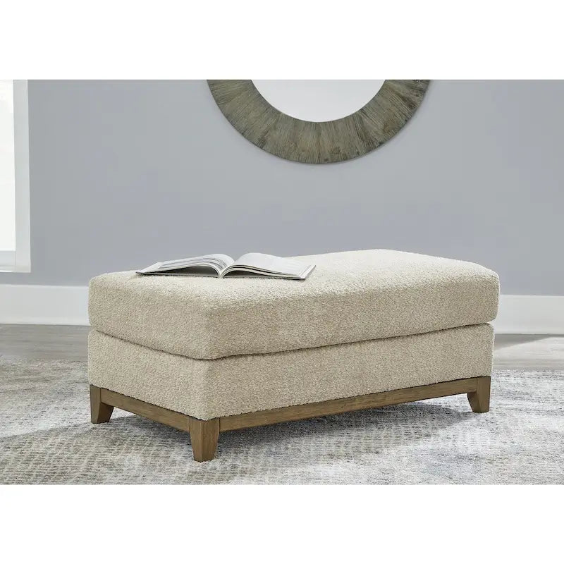 Ottoman rembourré avec bordure aspect bois